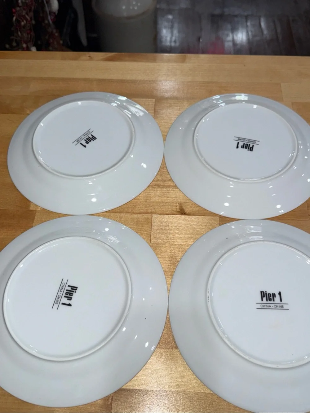 Pier 1 White Dinner Plates with Red and Gold Starburst Motif